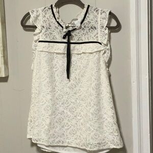Elegant White Lace Top with Black Trim